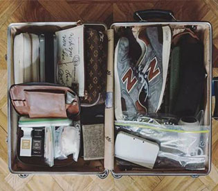 What good things should be in the perfect suitcase of a traveler?